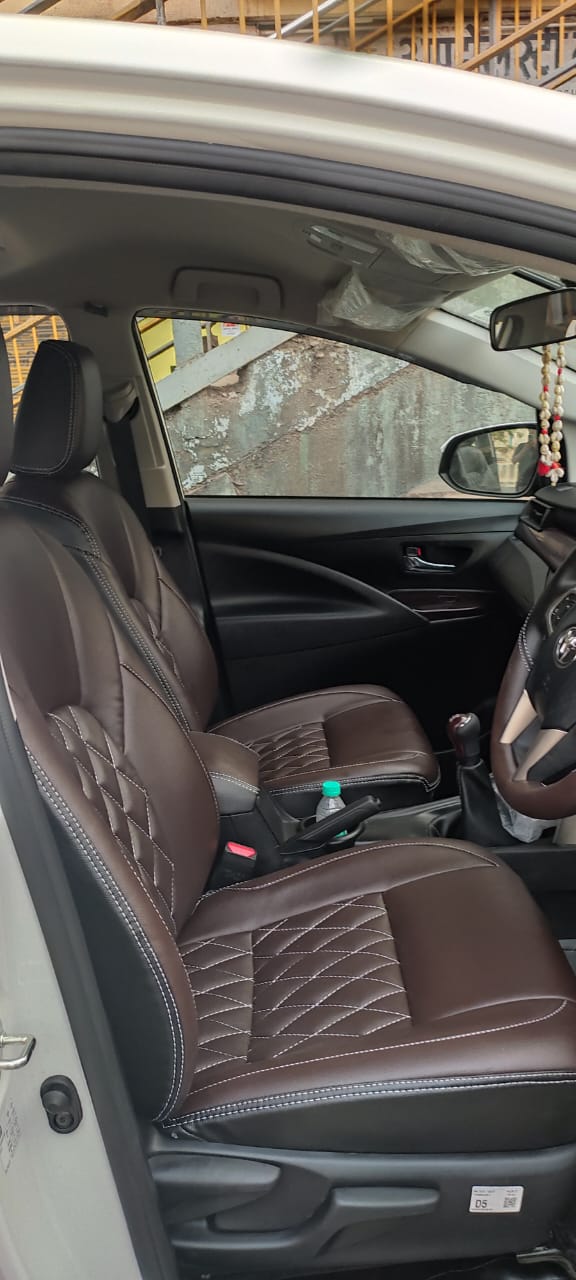 Innova Crysta interior with brown leatherette seats